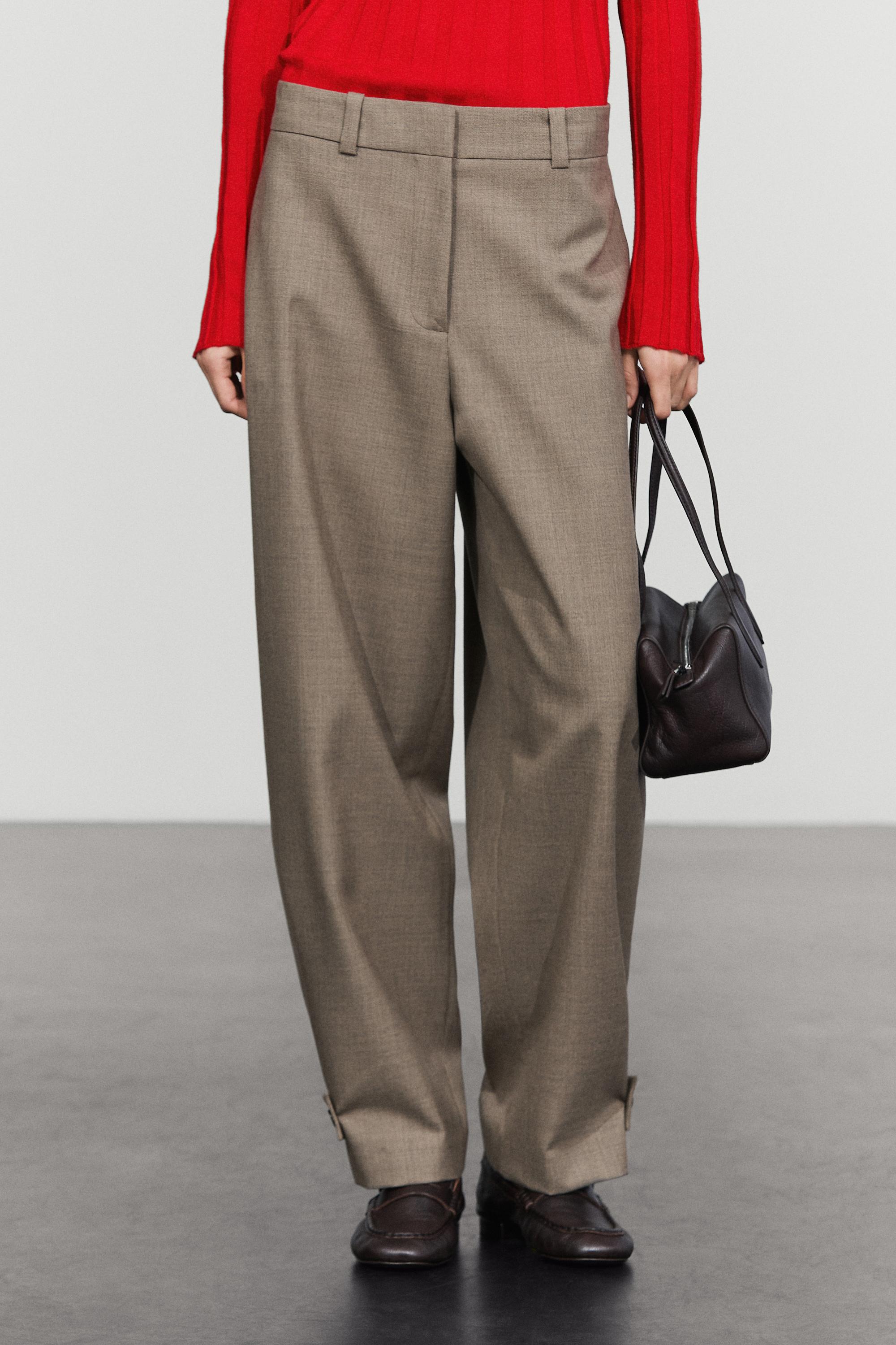 100% wool darted pants with buttoned hem detail